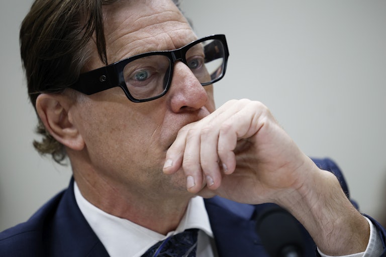 Acting FEMA Administrator David Richardson puts his hand on his mouth as if in deep in thought.