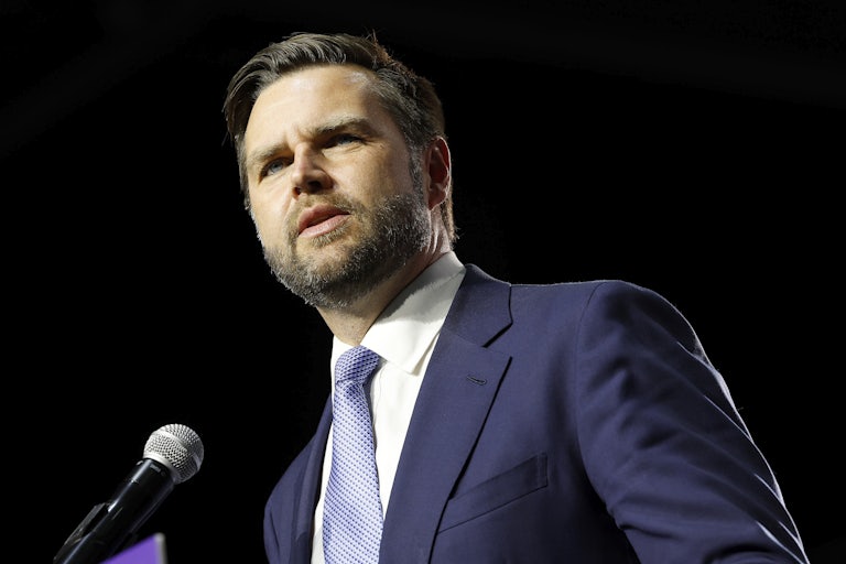 J.D. Vance speaks at a mic