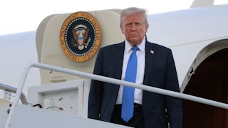 Donald Trump disembarks from Air Force One.