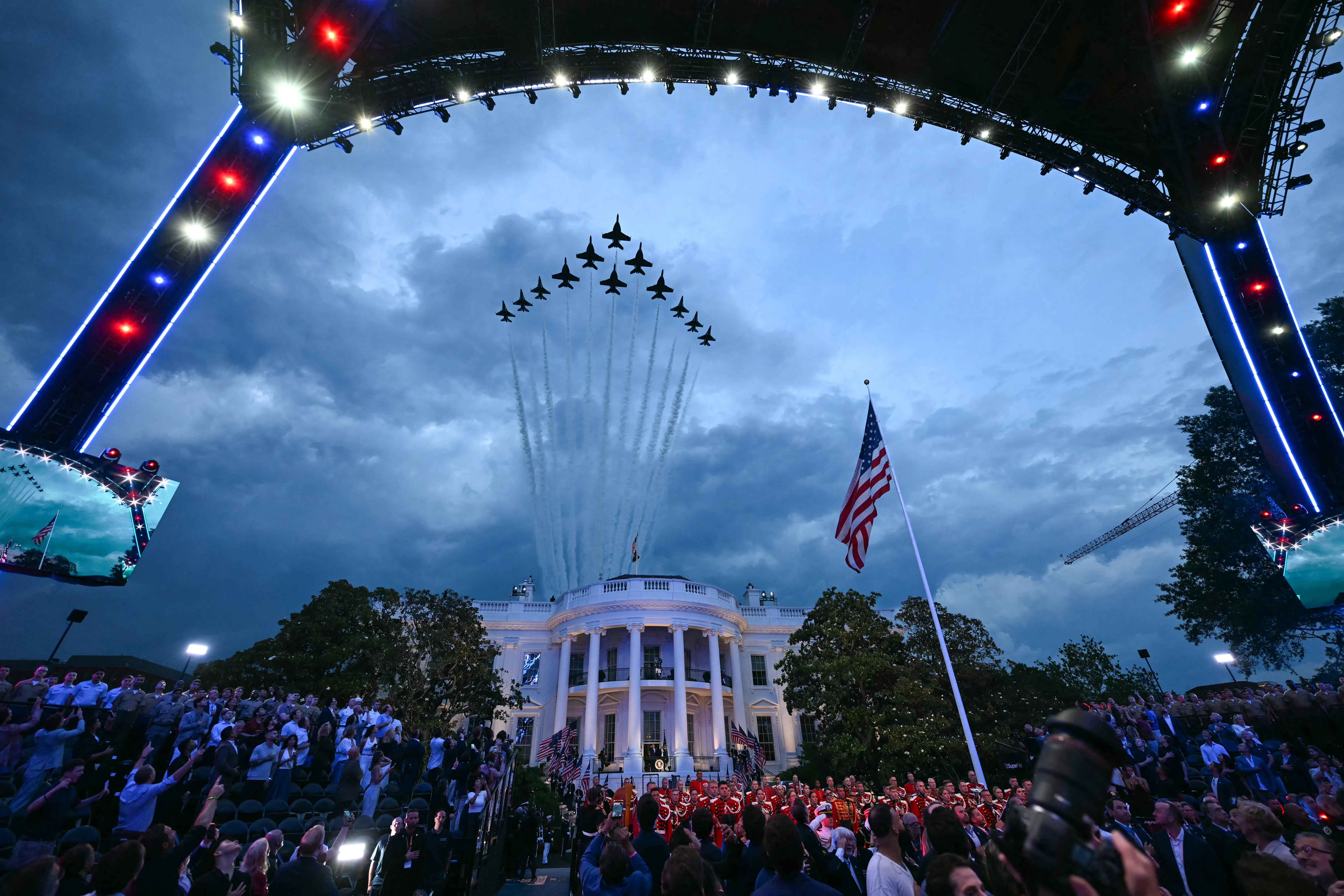 Military jets perform a flyover at Donald Trump's birthday UFC fight at the White House 