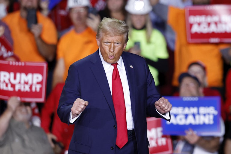 Donald Trump dances during a campaign rally