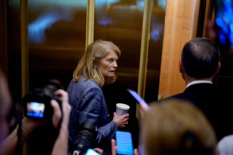 Senator Lisa Murkowski gets on an elevator in the Senate after voting on Donald Trump’s budget bill