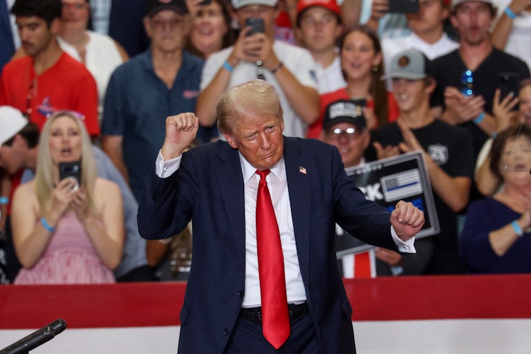 Donald Trump dances at a rally