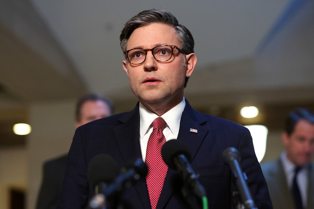 Mike Johnson at the podium