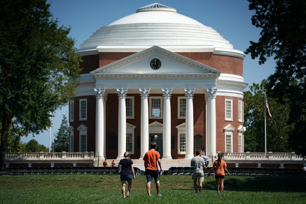 Students walk on The Lawn at the University of Virginia