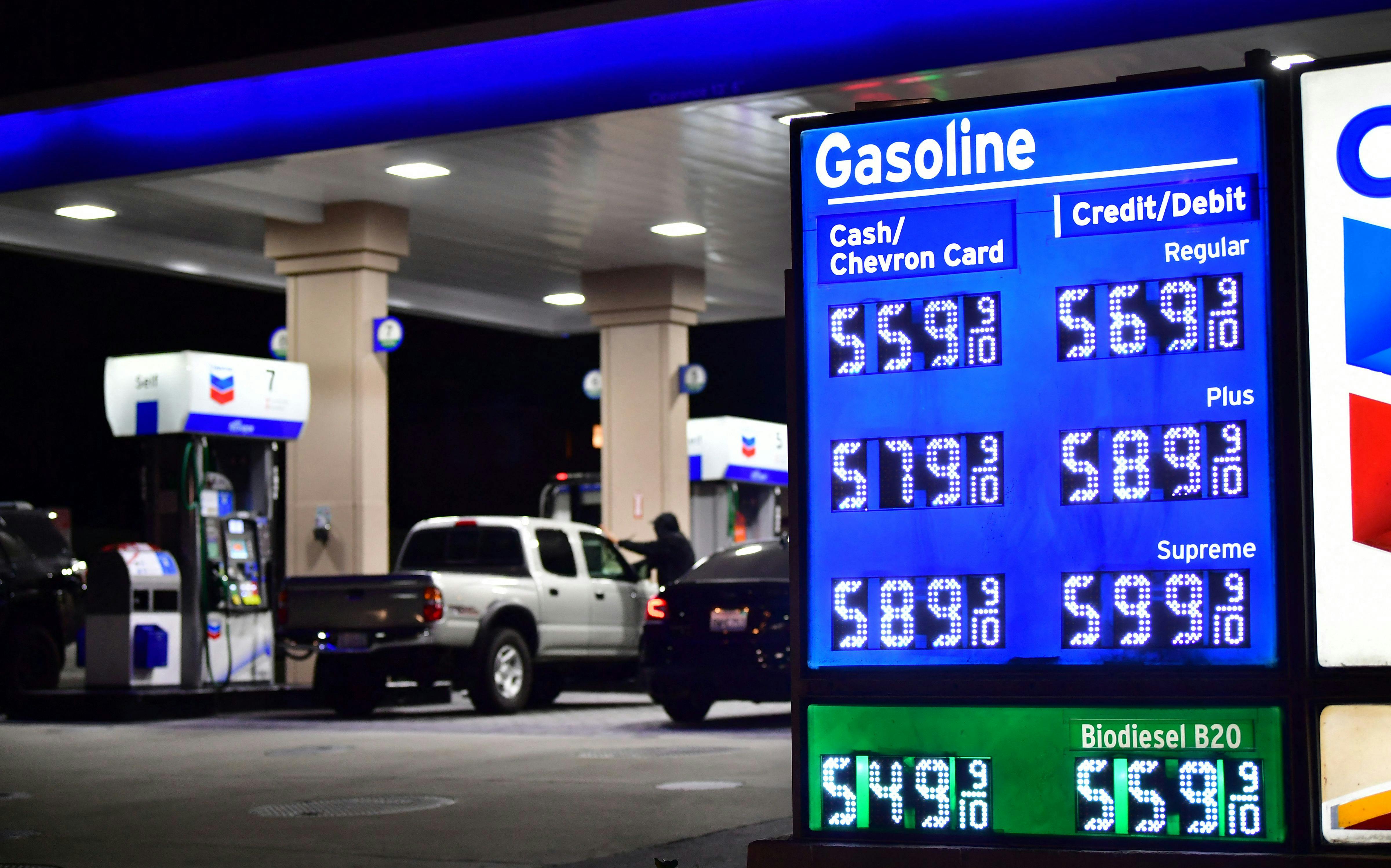 High gas prices of 5.69 9/10 per gallon are displayed at a California gas station on March 4.