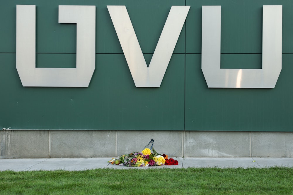 Flowers are left near a sign on the campus at Utah Valley University in Orem, Utah, on September 11, 2025, where political activist Charlie Kirk was shot and killed on September 10. Utah has some of the most permissive gun laws in the country.