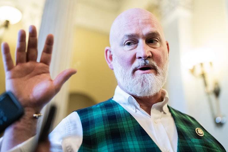 Derrick Van Orden holds up his hand as he speaks