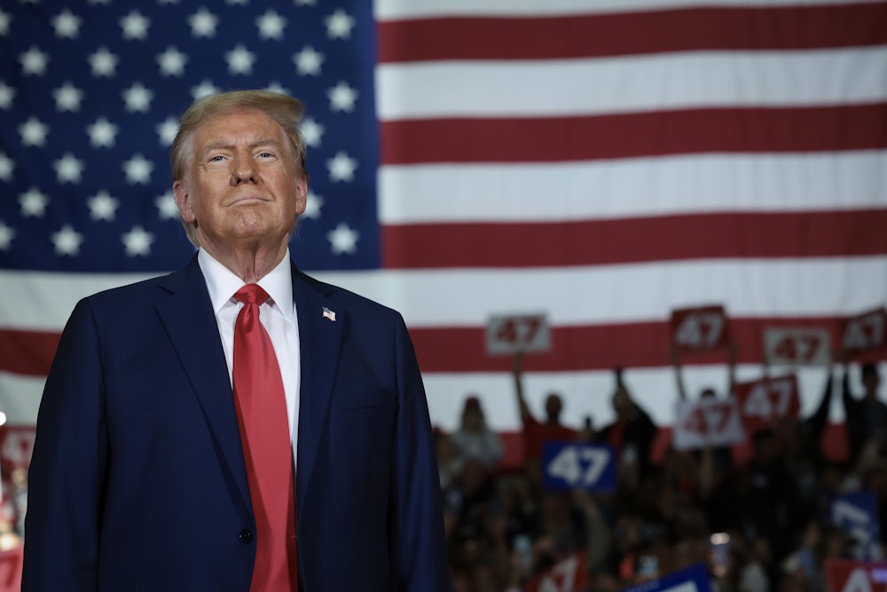 Donald Trump arrives on stage during a town hall campaign event at the Lancaster County Convention Center in Lancaster, Pennsylvania.