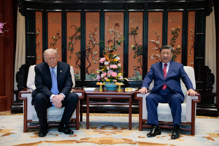 Chinese President Xi Jinping and President Donald Trump attend a meeting on the sidelines during a tour of the Zhongnanhai Garden on May 15, 2026 in Beijing, China.
