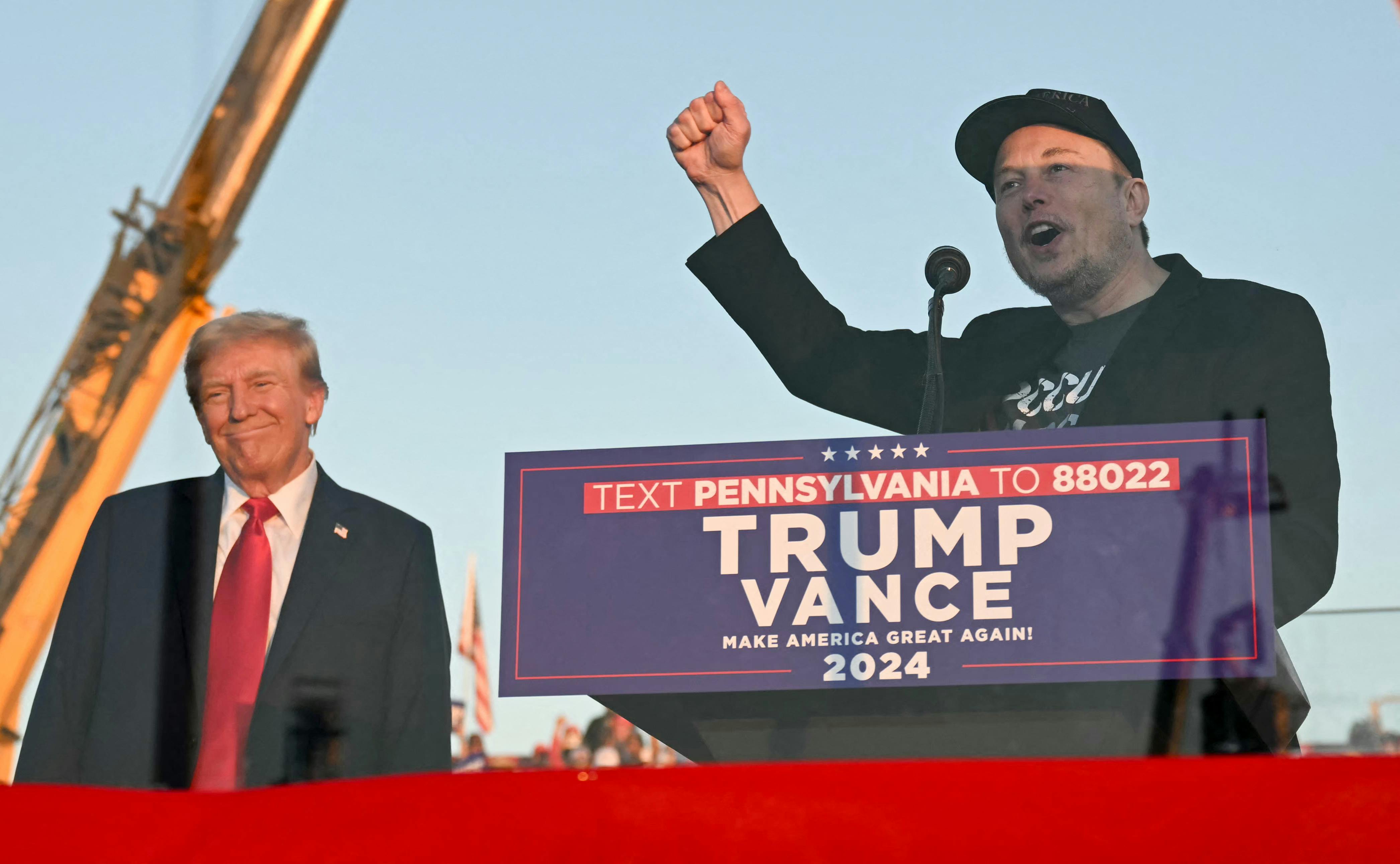 Tesla CEO Elon Musk speaks on stage as he joins former president and Republican presidential candidate Donald Trump during a campaign rally in Butler, Pennsylvania on October 5, 2024. 