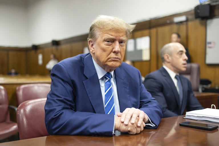 Donald Trump sits in the courtroom during his hush-money trial