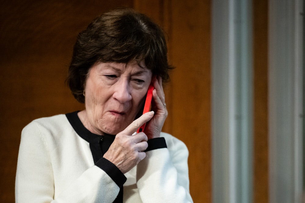 Senator Susan Collins, a Republican from Maine, speaks on the phone.