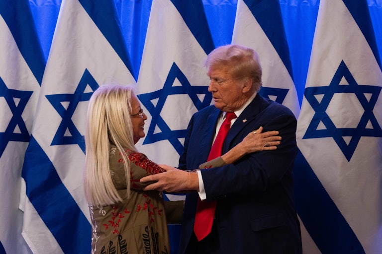 Donald Trump hugs Israeli-American donor Miriam Adelson