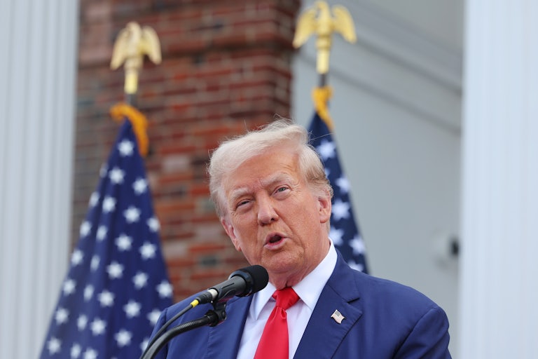 Donald Trump narrows his eyes while speaking and makes a weird face