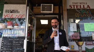 Zohran Mamdani outside a deli in Queens