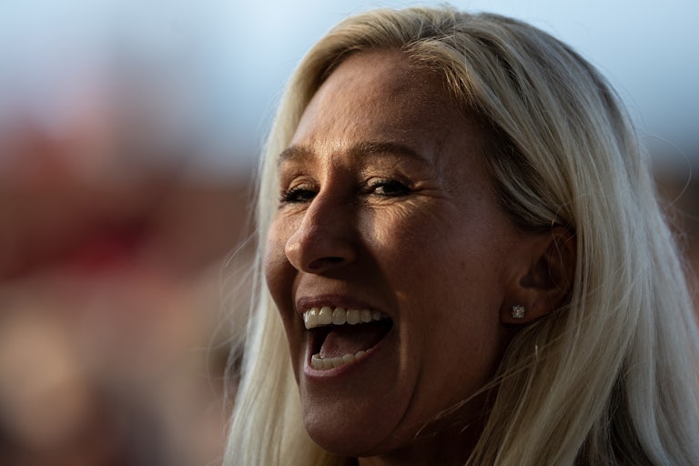 Marjorie Taylor Greene smiles