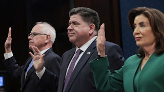 Democratic Governors Tim Walz, J.B. Pritzker, and Kathy Hochul are sworn in before the start of a hearing with the House Oversight and Accountability Committee at the U.S. Capitol.