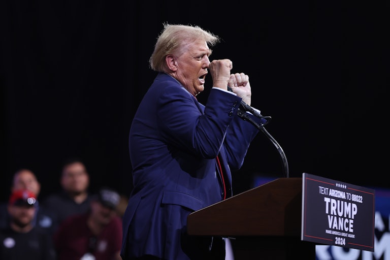 Donald Trump dances during a campaign event
