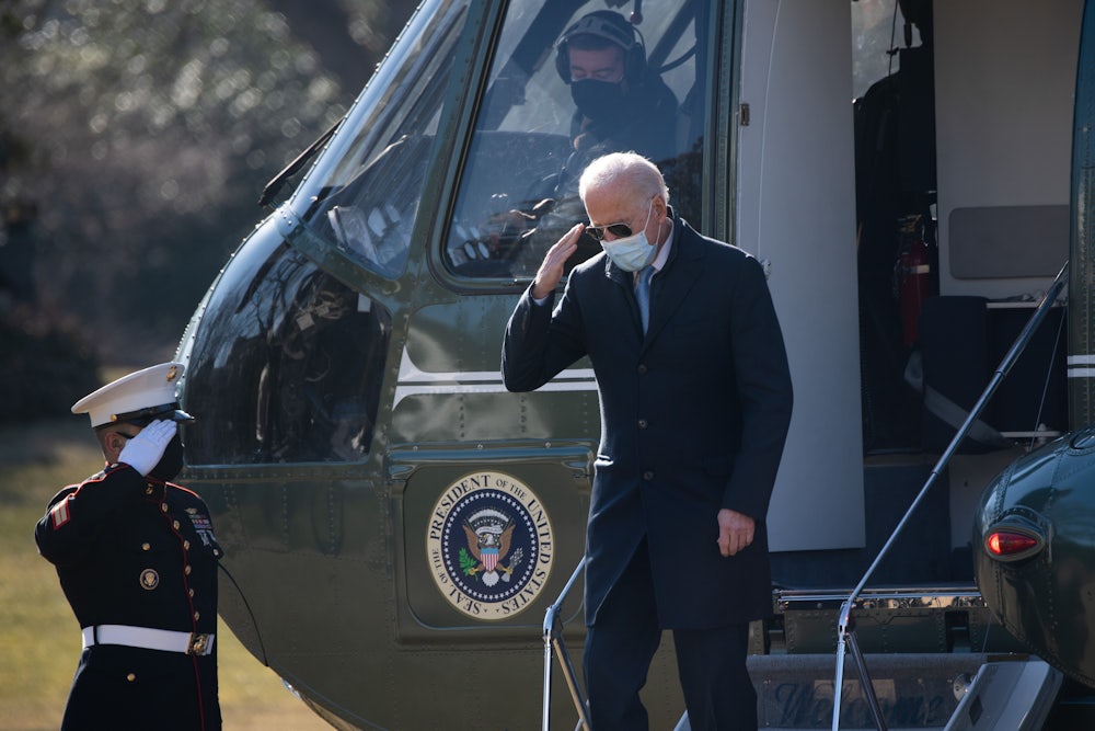 Biden exits the Marine One helicopter