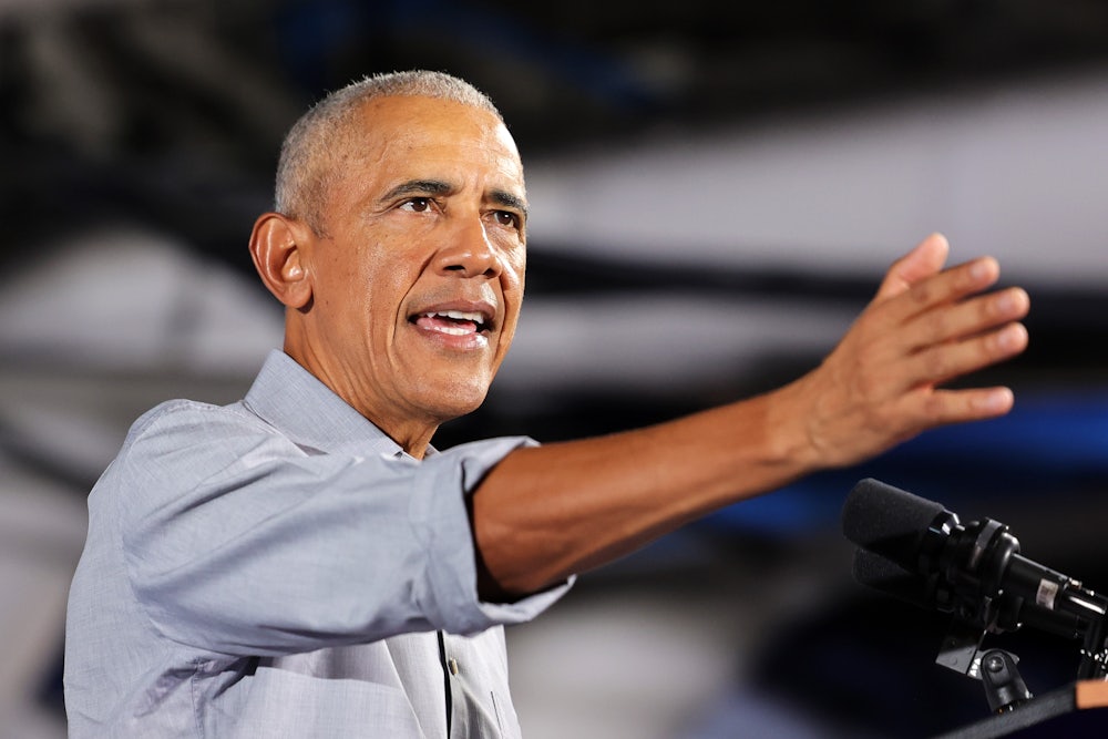Barack Obama gestures with hand while speaking