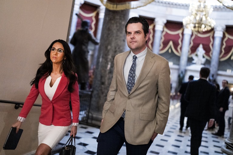 Representative Lauren Boebert and former Representative Matt Gaetz walk in the Capitol