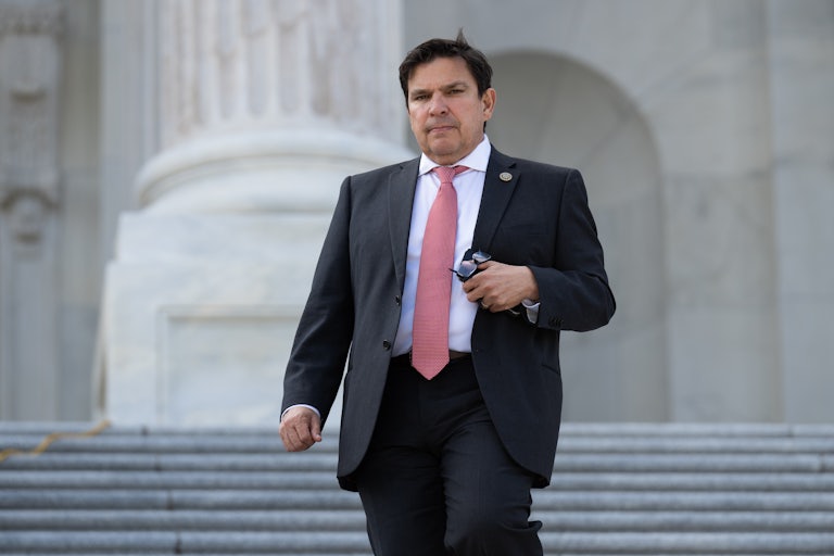 Vincente Gonzalez walks down the steps of the Capitol