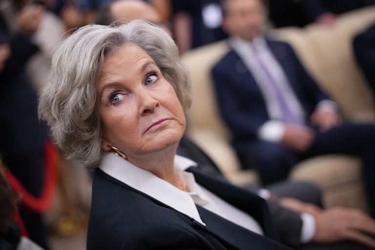 Susie Wiles raises her eyebrows while in an Oval Office meeting.