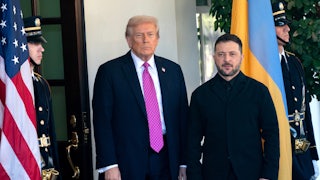 Donald Trump and Ukrainian President Volodymyr Zelenskiy stand next to each other at the White House entrance
