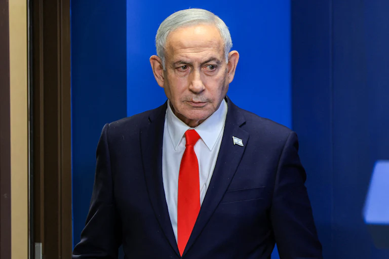 Israeli Prime Minister Benjamin Netanyahu looks to the side