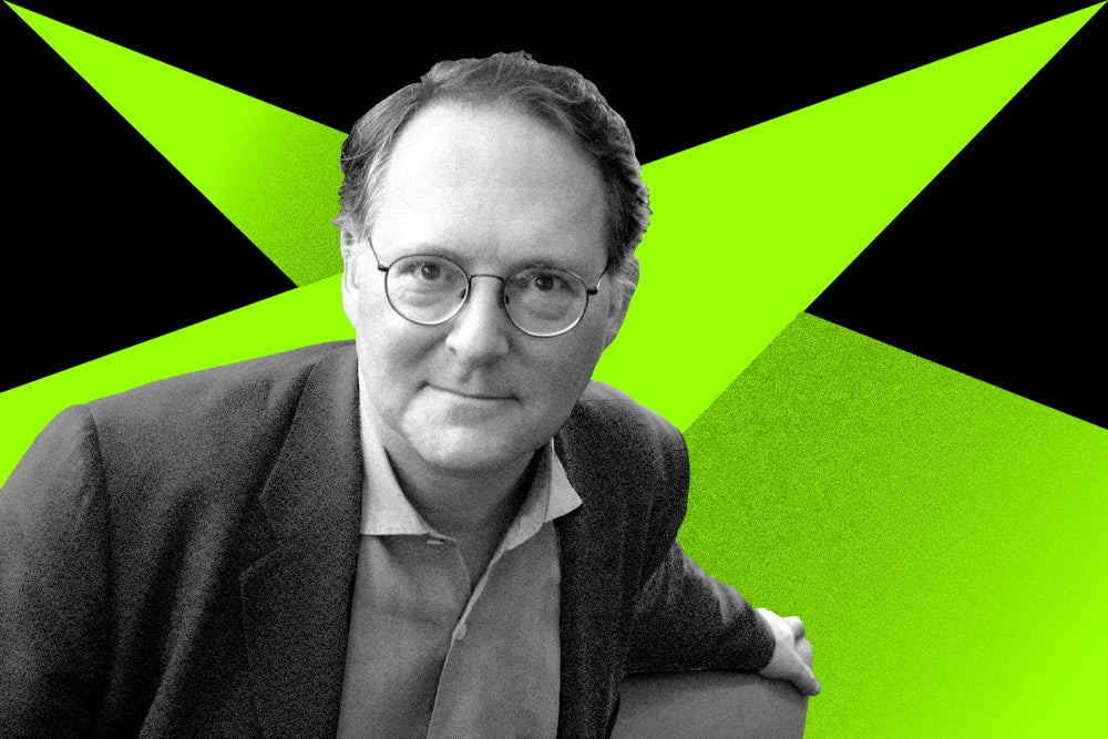 Craig Unger in front of a green and black background