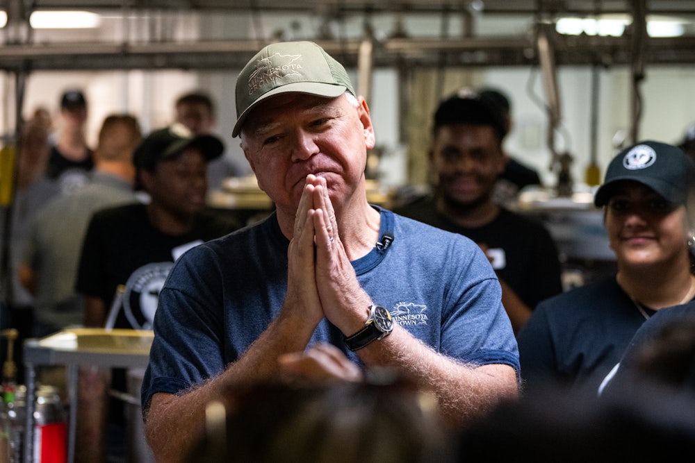 Tim Walz thanks supporters after serving ice cream at the Dairy Barn in the Minnesota State Fair.
