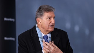 Senator Joe Manchin speaks while gesticulating.