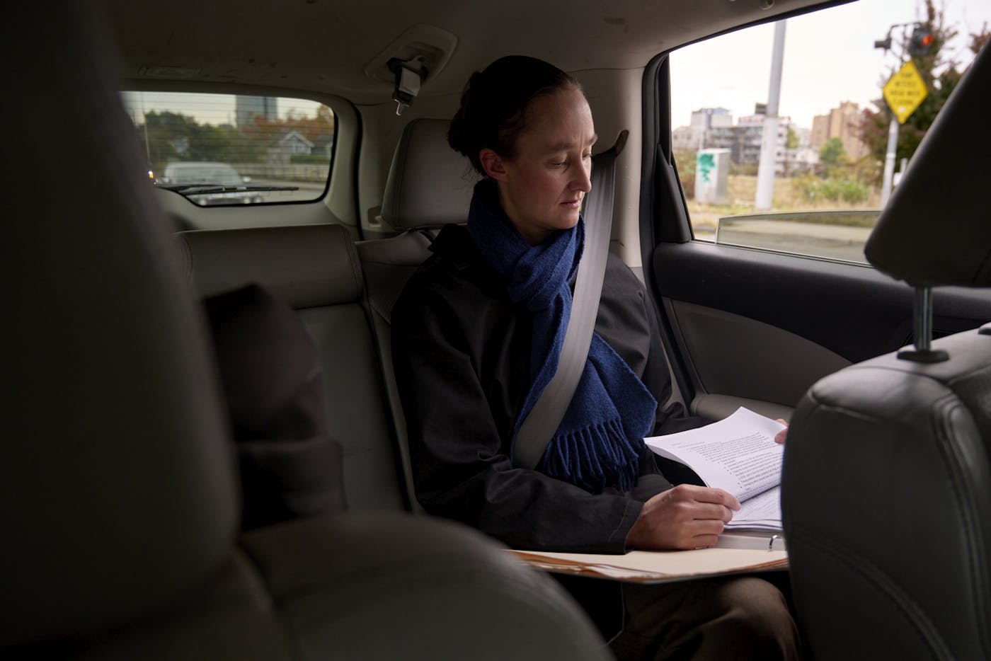 Katie Wilson works from the car