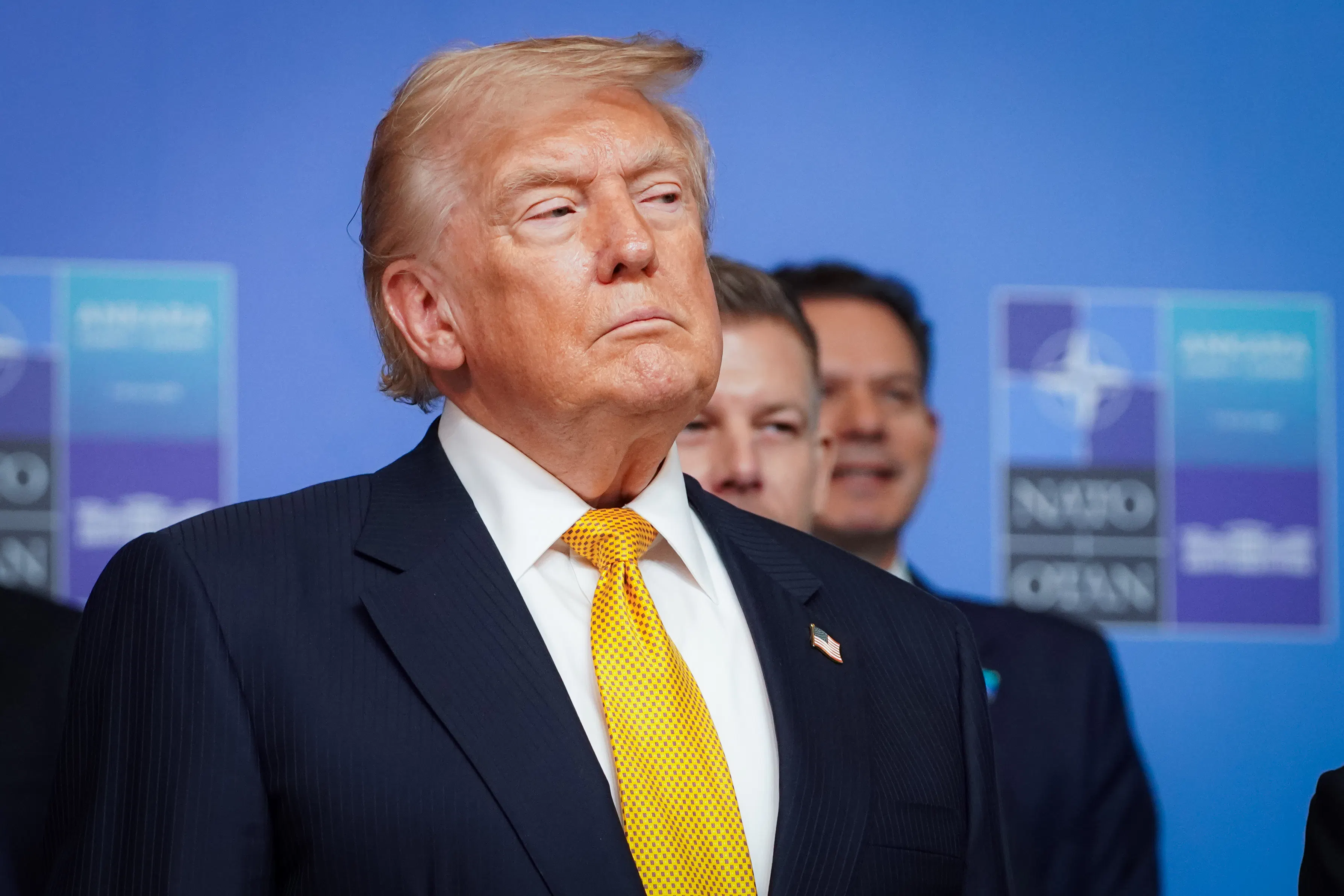 Donald Trump glares to his left