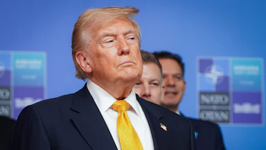 Donald Trump glares to his left