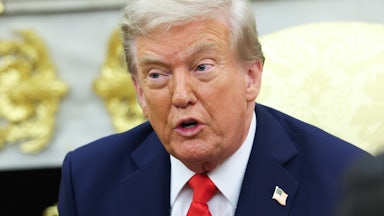 Donald Trump speaks while sitting in the Oval Office.