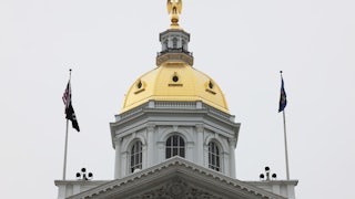 New Hampshire state Capitol (with a gold eagle on top)