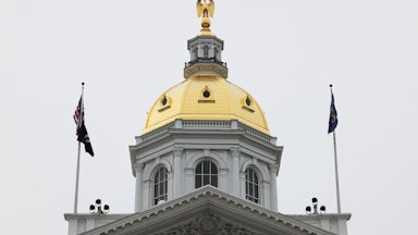 New Hampshire state Capitol (with a gold eagle on top)
