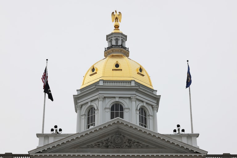 New Hampshire state Capitol (with a gold eagle on top)