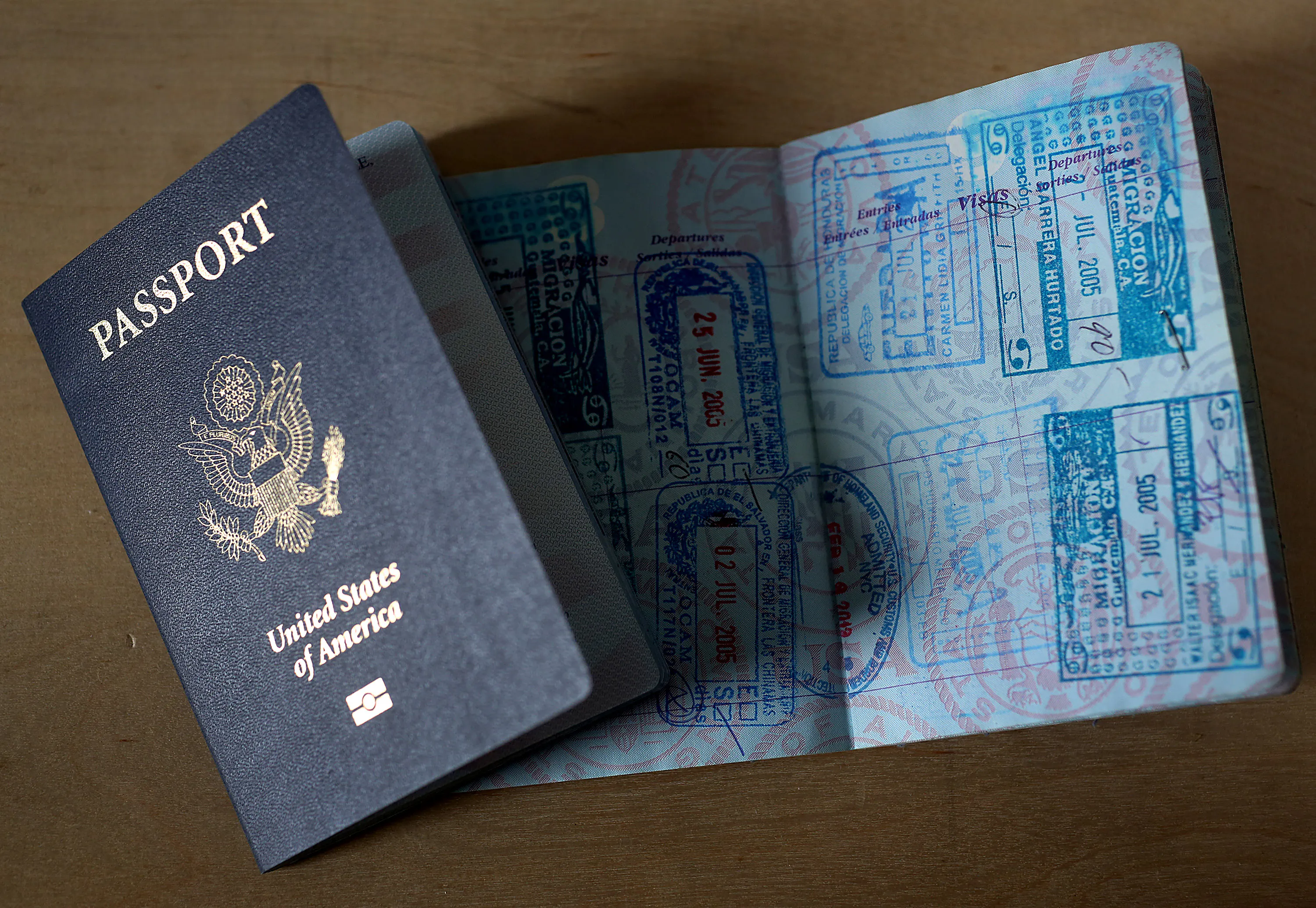 U.S. passports, one open with stamps and one closed