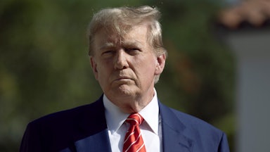 Donald Trump wears a "My vote counts" sticker