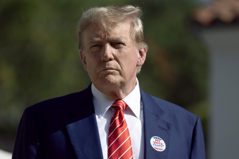 Donald Trump wears a "My vote counts" sticker