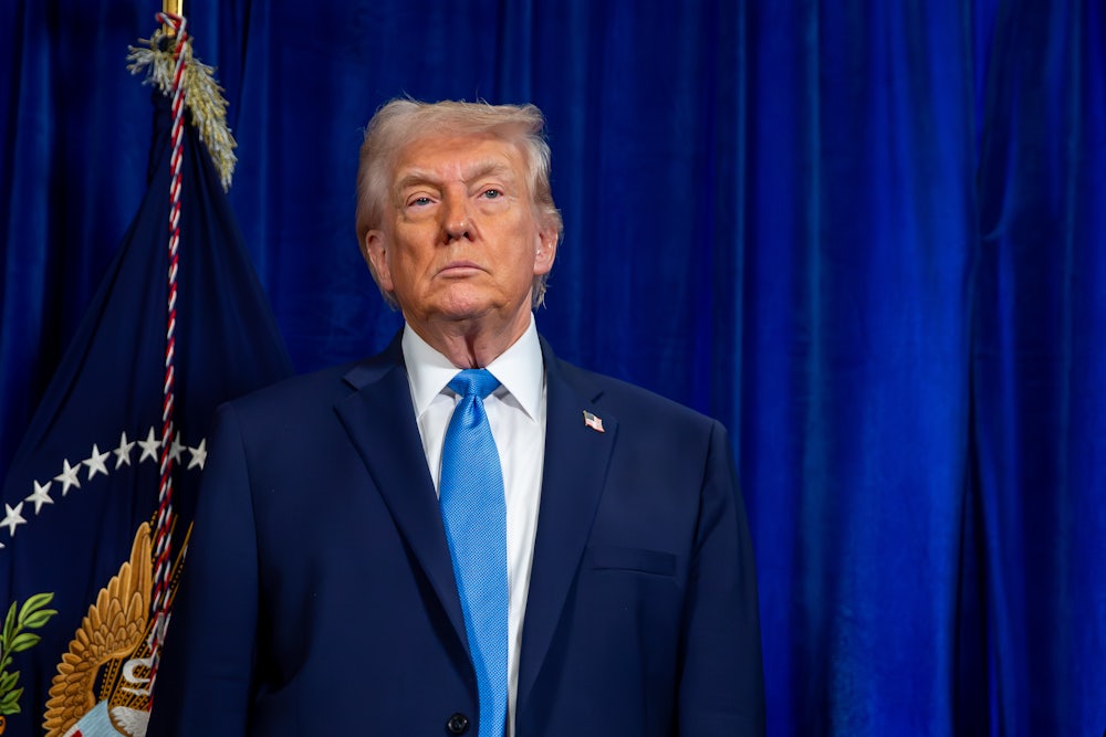 Donald Trump standing and frowning