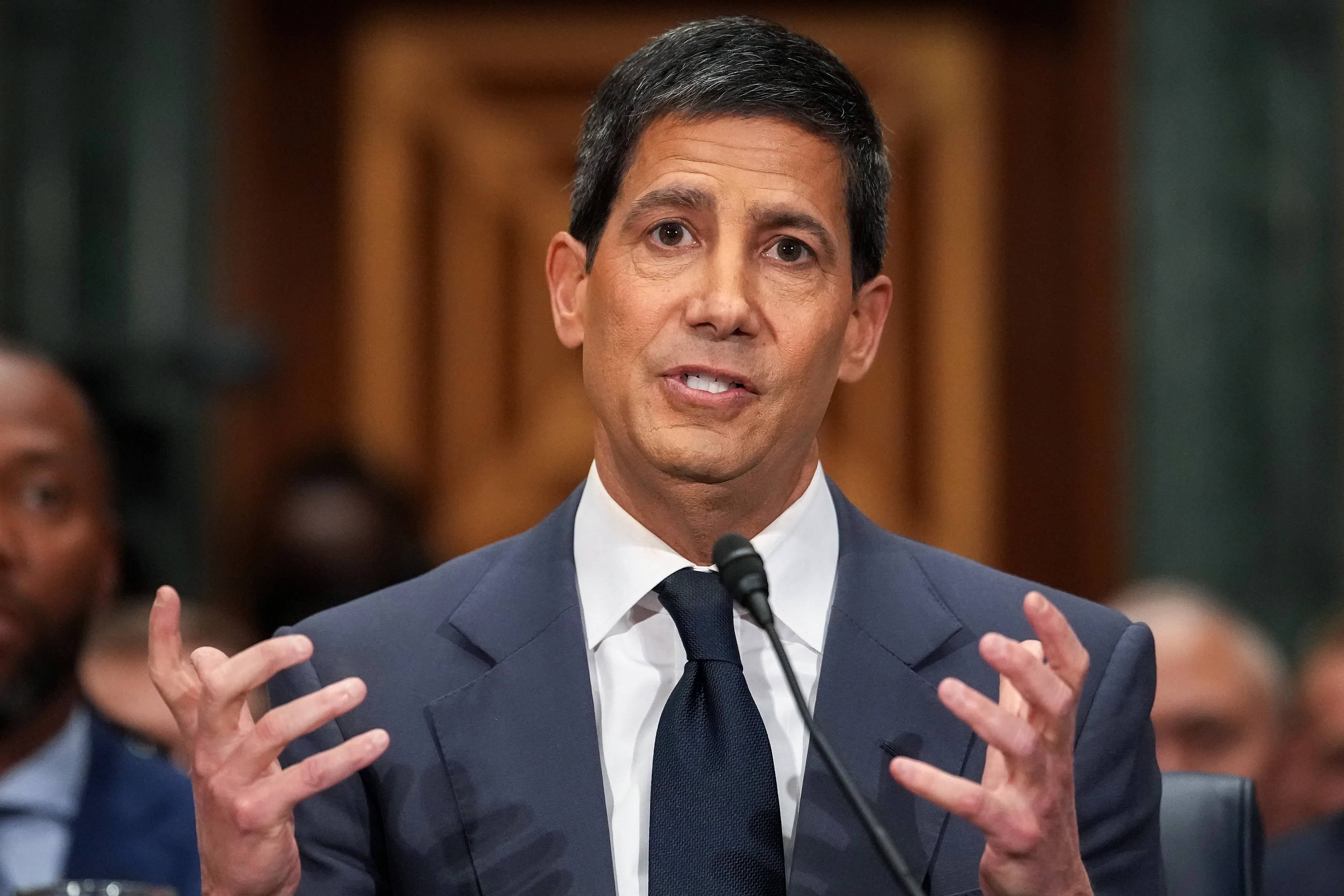 Federal Reserve chair nominee Kevin Warsh gestures and speaks during his Senate committee confirmation hearing