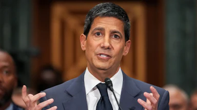 Federal Reserve chair nominee Kevin Warsh gestures and speaks during his Senate committee confirmation hearing