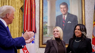 President Donald Trump applauded after Tulsi Gabbard was sworn in as the director of national intelligence by Pam Bondi, the attorney general, on February 12.