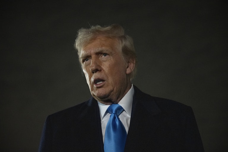 Donald Trump speaks to reporters at Joint Base Andrews