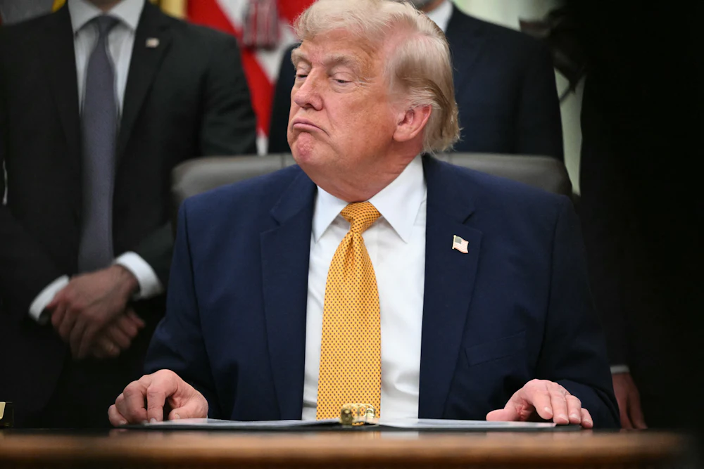 Donald Trump frowns petulantly