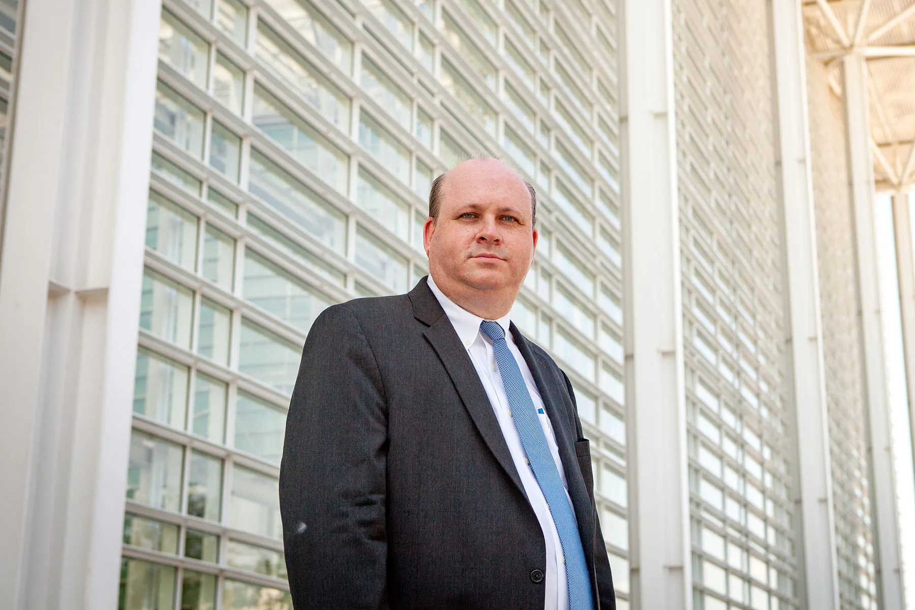 A photograph of attorney Marc Elias outside of Sandra Day O'Connor United States Courthouse in Phoenix, AZ,
